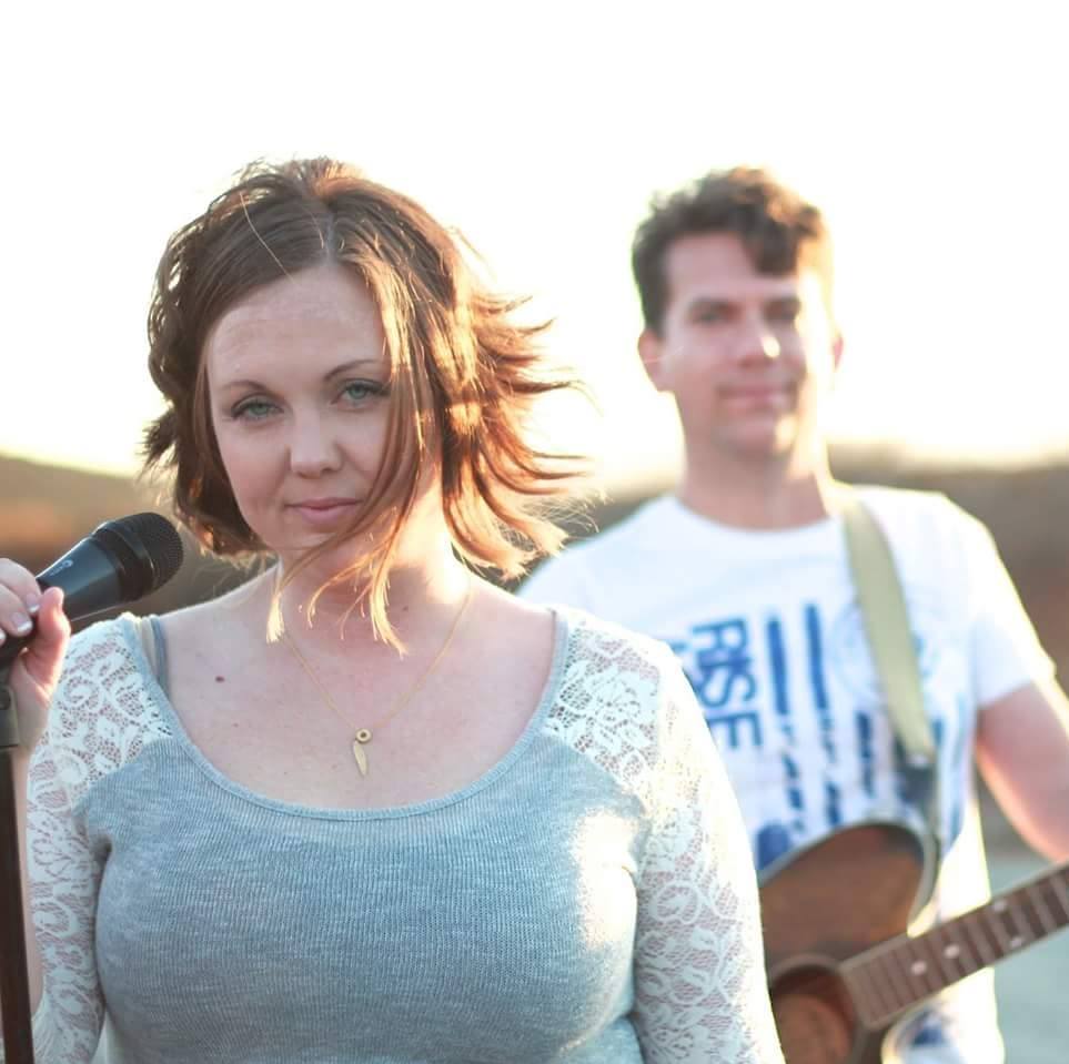 Jeney Kingsbury and Bill Gould walking together in a runway photo